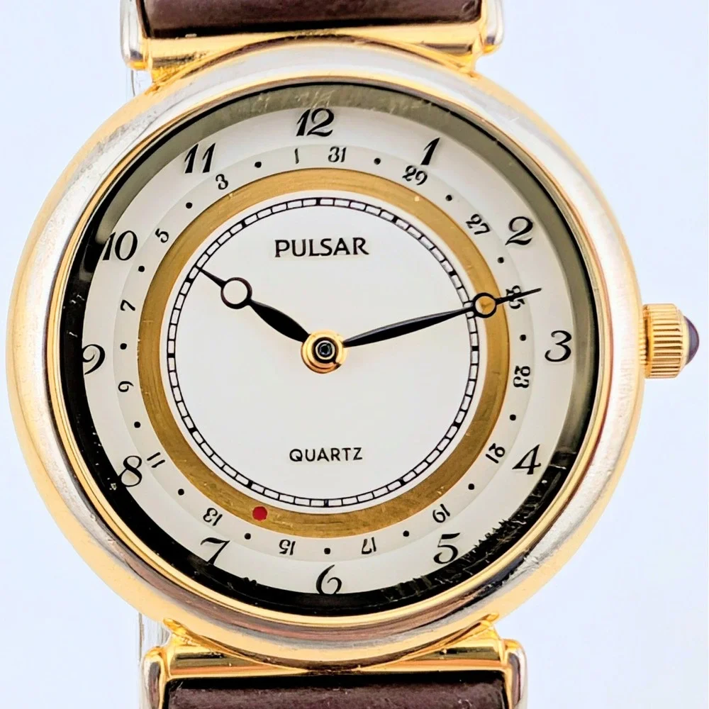 Pulsar V249-0030 Date Pointer Gold Tone White Dial Brown Leather Women's Watch